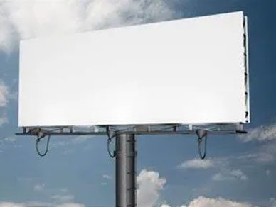 A large billboard with a sky background